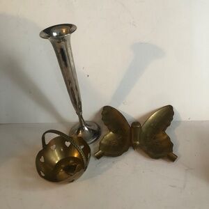 Three vintage decorative pieces. Butterfly ashtray, brass basket and silver bud